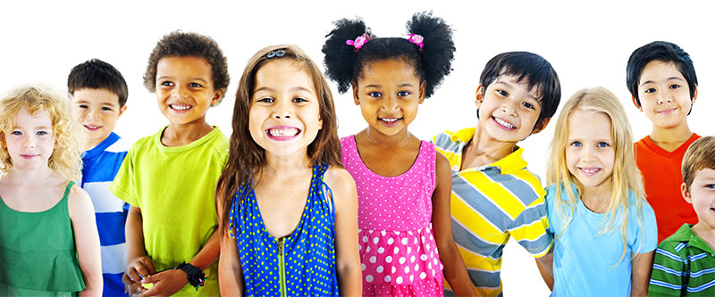 A diverse group of children posing for a photo with colorful clothing and accessories.